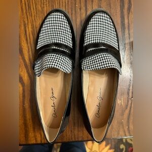 Amanda Grace Black and white loafers.